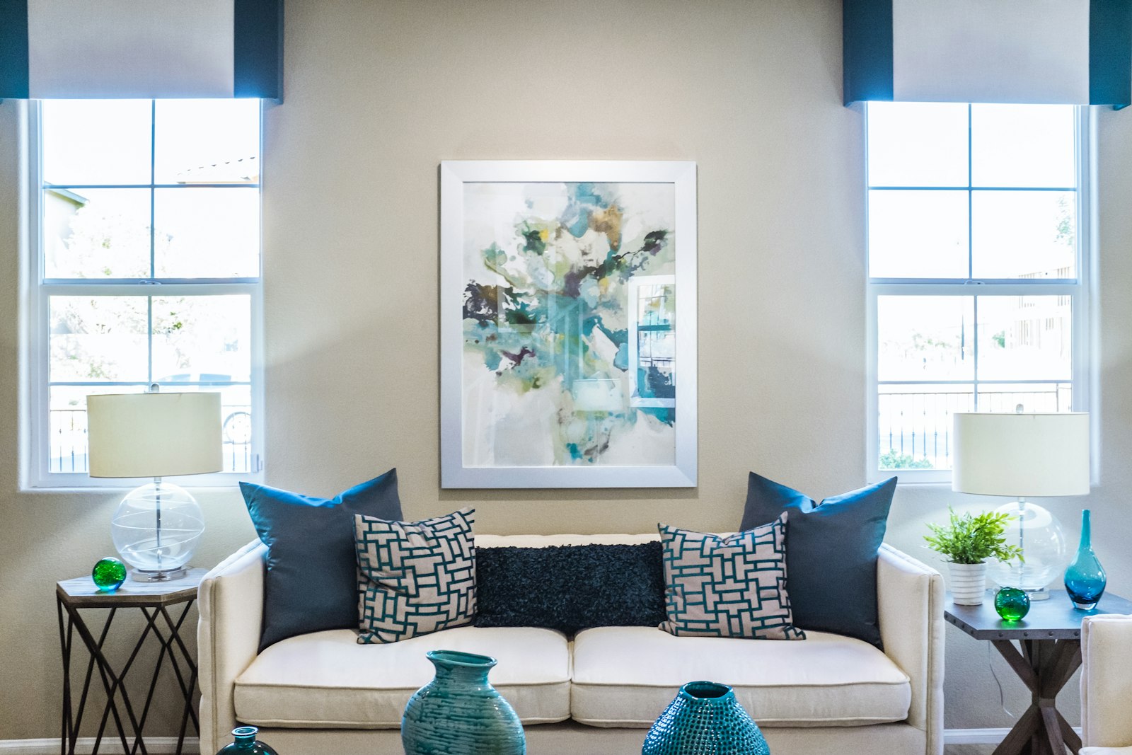 A muted-toned property detail — natural wood, soft textile, low warm light